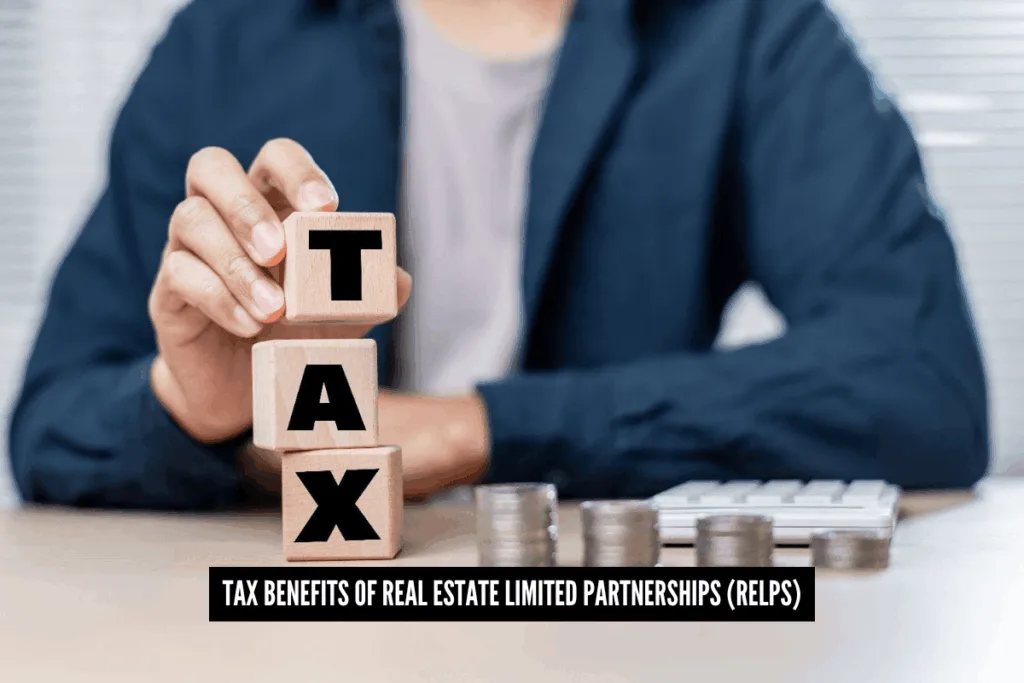 A person stacks wooden blocks spelling "TAX" beside piles of coins and a calculator. Text reads, "Tax Benefits of Real Estate Limited Partnerships (RELPs)."